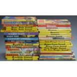 Thirty-nine western annuals including The Lone Ranger, Bonanza, Rawhide, Wagon Train, The High