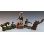 Three vintage novelty cast iron money boxes comprising 'Uncle Sam Bank', 'Teddy and the Bear' and