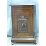 Mahogany purdonium with lift up lid and tilt out front compartments, height 61cm