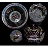 Four Whitefriars glass paperweights comprising Silver Jubilee faceted example with millefiori