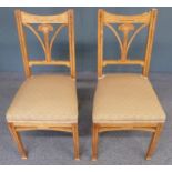 Pair of inlaid oak Arts & Crafts style chairs