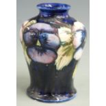 Moorcroft baluster vase decorated in the Pansy pattern, signed and impressed Moorcroft and 'by