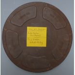 Two 16mm sound film reels, one Buster Keaton Chemist, the other the Three Stooges Halfwits Holiday