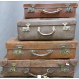 Four various vintage suitcases, three being leather, width of largest 62cm