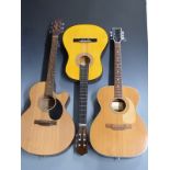 Three various acoustic guitars Jasmine S34c, in semi-rigid fitted carry case, a Harmony 6395 and a