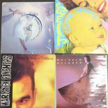 Approximately 50 twelve inch singles including The The, Bruce Springsteen, U2, Bauhaus, Frankie Goes