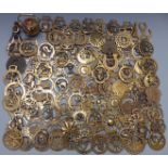 Approximately 100 horse brasses including Victorian 1870 and souvenir examples