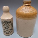Two Stroud stoneware bottles comprising a flagon impressed H & J Bateman, Stroud and a Stroud