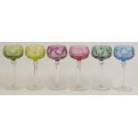 A set of six flash overlaid glass hock glasses all with cut decoration, octagonal stems and star cut