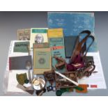 A collection of Scouting movement memorabilia comprising cloth and metal badges including an early