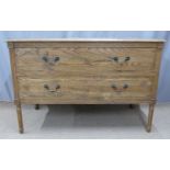 Three pieces of oak furniture including two drawer chest of drawers and a pair of tables with