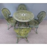 Cast metal garden table and four chairs, diameter 68, height 70cm