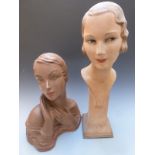 Two vintage haberdashery or shop display female heads or busts, one signed Reilaw, height of tallest