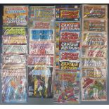 Approximately  27 Marvel Captain Britain and Captain America comics.