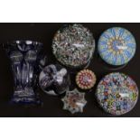 Six various glass paperweights, most with multi-coloured millefiori canes and one signed to base,