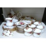 Approximately thirty four pieces of Royal Albert Old Country Roses dinner and tea ware