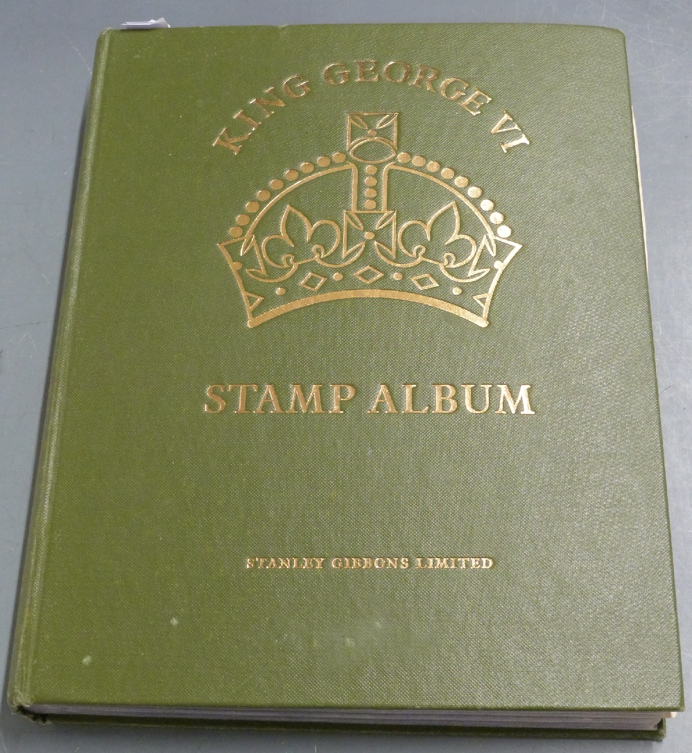 King George VI album of mint and used Commonwealth stamps