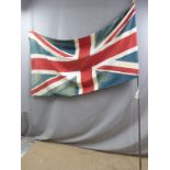 Vintage Union Jack flag on pole