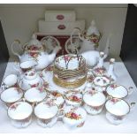 Approximately 37 pieces of Royal Albert Old Country Roses tea and dinnerware, with three similar