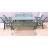 Cast iron wooden slatted garden furniture comprising table, bench and four chairs, length of table
