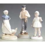 Three Royal Copenhagen / Bing and Grondahl figures, tallest 21cm