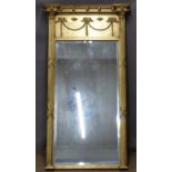 Bevelled edge gilt framed mirror with swag decoration, overall size 127 x 69cm