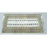 Gold and cream Turkoman rug 208 x 100cm
