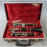 Cased Boosey and Hawkes composite bodied clarinet