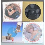 Approximately 40 ten inch, twelve inch and shaped picture discs including Madonna, Sparks, Cher, A-