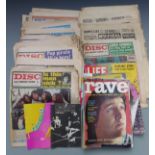 A collection of mixed music related publications including Rolling Stones book, Rave, Disc and Music