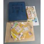 Standard stamp album and contents and two packets of loose stamps