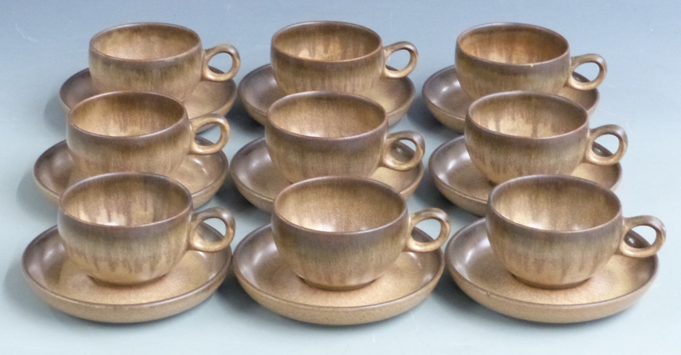Nine Denby Romany cups and saucers
