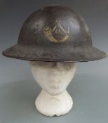 British Army WW1 steel Brodie helmet with regimental insignia to front for the King's Shropshire