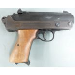 Record Jumbo .177 air pistol with walnut grips and adjustable sights, serial number 10792.