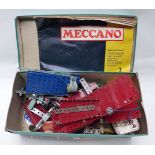 A small collection of loose Meccano including wheels and motors together with a Book Of Models 2.