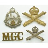 British Army three Machine Gun Corps metal badges including one by Gaunt of London, together with an