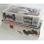 Two 1:10 scale remote controlled model car kits Tamiya Alfa Romeo 155 V6 TI Bosch 58195 and Team