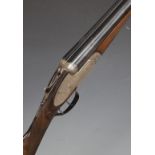 Denton & Kennell of Somerton 12 bore side by side ejector shotgun with scrolling engraving to the