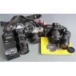 SLR cameras, lenses and accessories to include Canon EOS650 with 35-70mm Canon lens, Fujica ST701