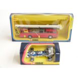 Two Corgi diecast model vehicles Simon Snorkel Dennis fire engine 1126 and Team Surtees T.S.9.