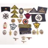 Replica Nazi German badges and insignia to include armband, enamel Olympic pendant, SS dagger