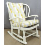 An upholstered rocking chair,  H90cm