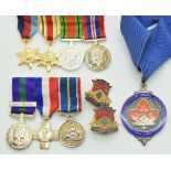 Two set of miniature medals together with a hallmarked silver Ealing Philanthropic Institution medal