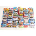 Forty Siku, Matchbox, Hotwheels and Corgi diecast model vehicles, all in original blister packs.