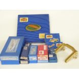 A collection of Hornby Dublo 00 gauge buildings and accessories including Through Station, Level