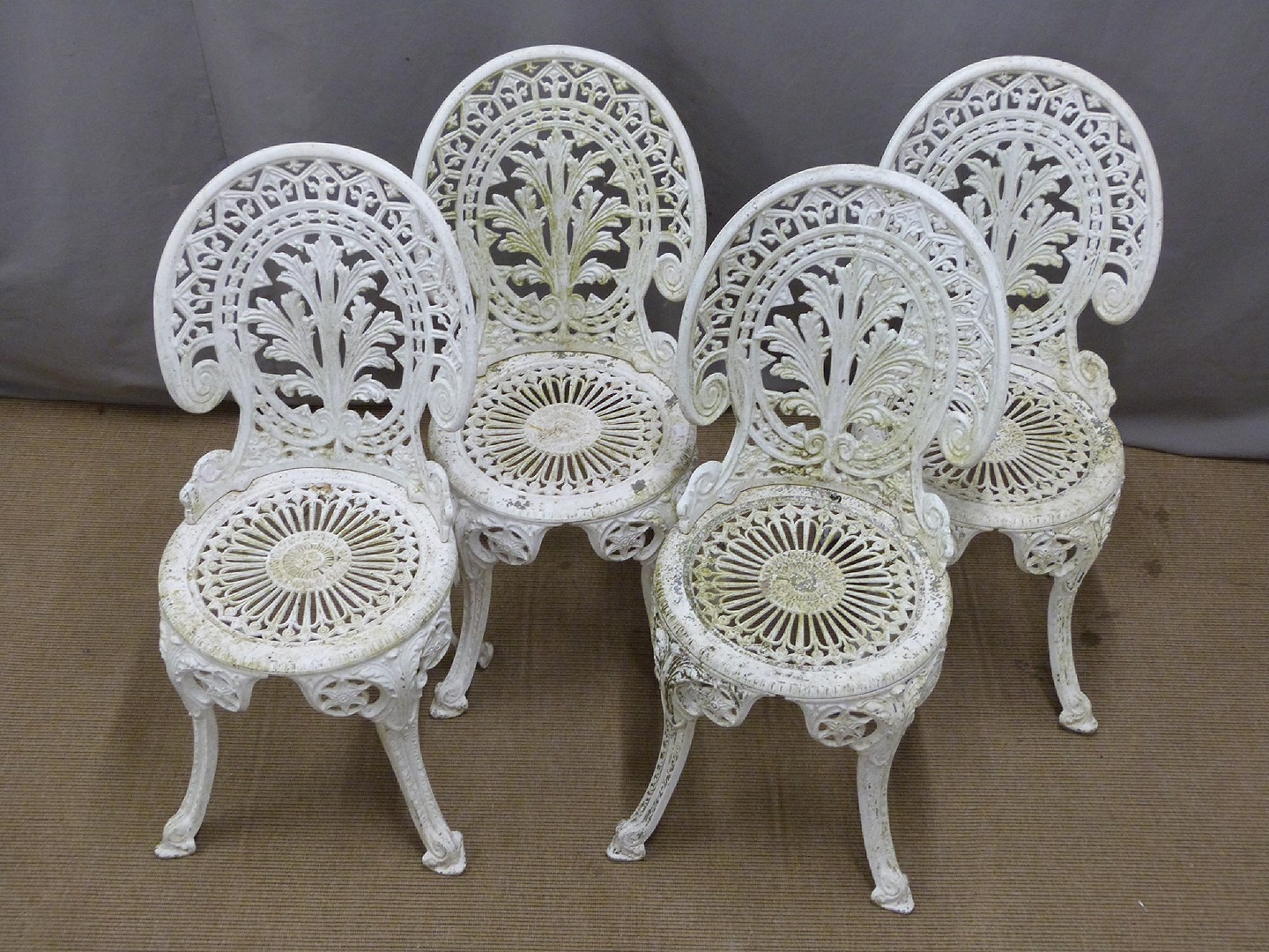 A decorative cast metal circular garden table and four chairs, diameter 80cm, height 70cm - Image 2 of 4