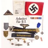 Replica Nazi German insignia and badges to include Luftwaffe, cap insignia, armband, medal bar etc