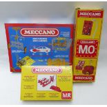 Three Meccano motors M.O., M.R. and No.1 Clockwork Motor, all in original boxes together with a