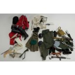 A collection of Palitoy Action Man action figure doll outfits and accessories including Household