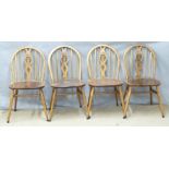 Four elm seated chairs